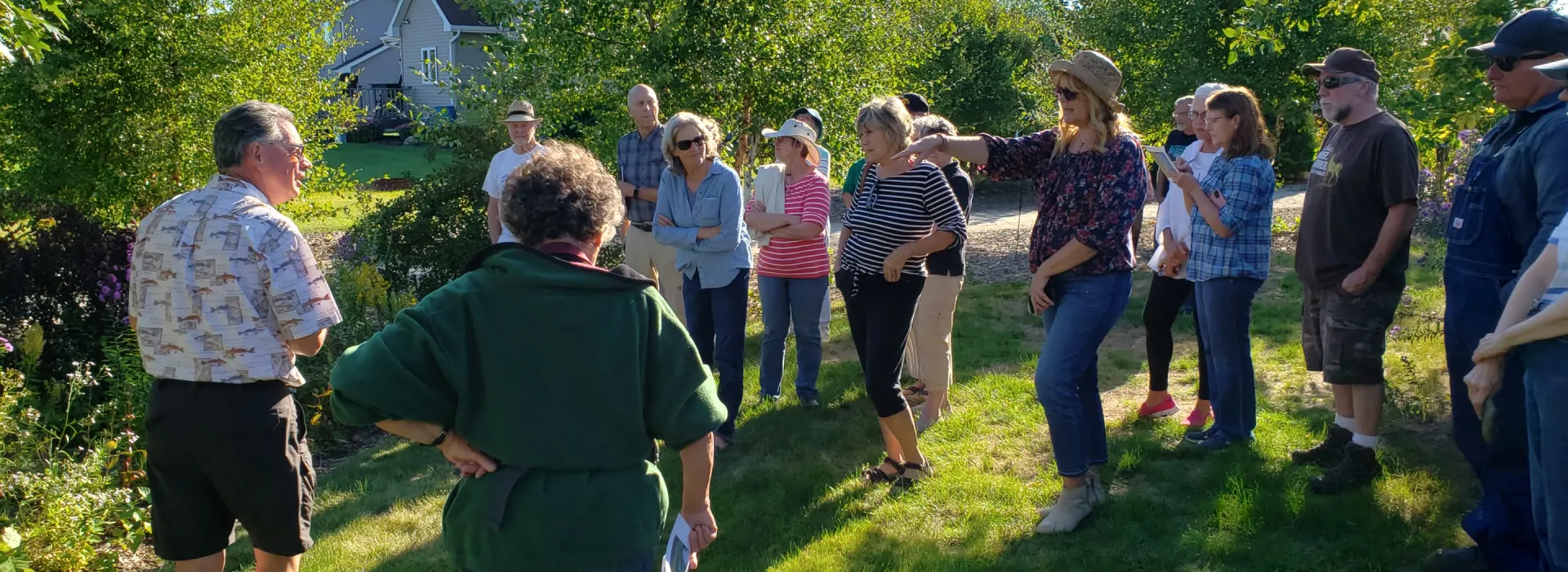 Mark Holey and Sue Kunz lead a walking tour of the prairie garden.
